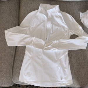 Size 4 lululemon pull over in white